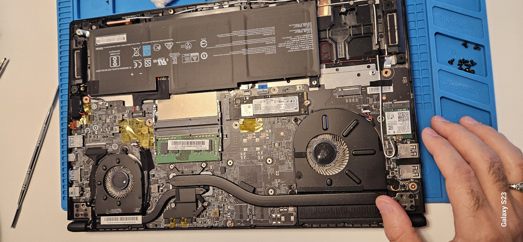 Laptop logic board opened for component-level diagnostics